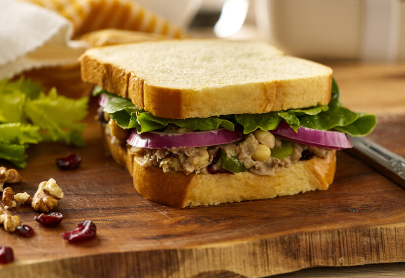 Back to school sandwiches: a Chickpea, Walnut and Cranberry sandwich on St Pierre Sliced Brioche Loaf