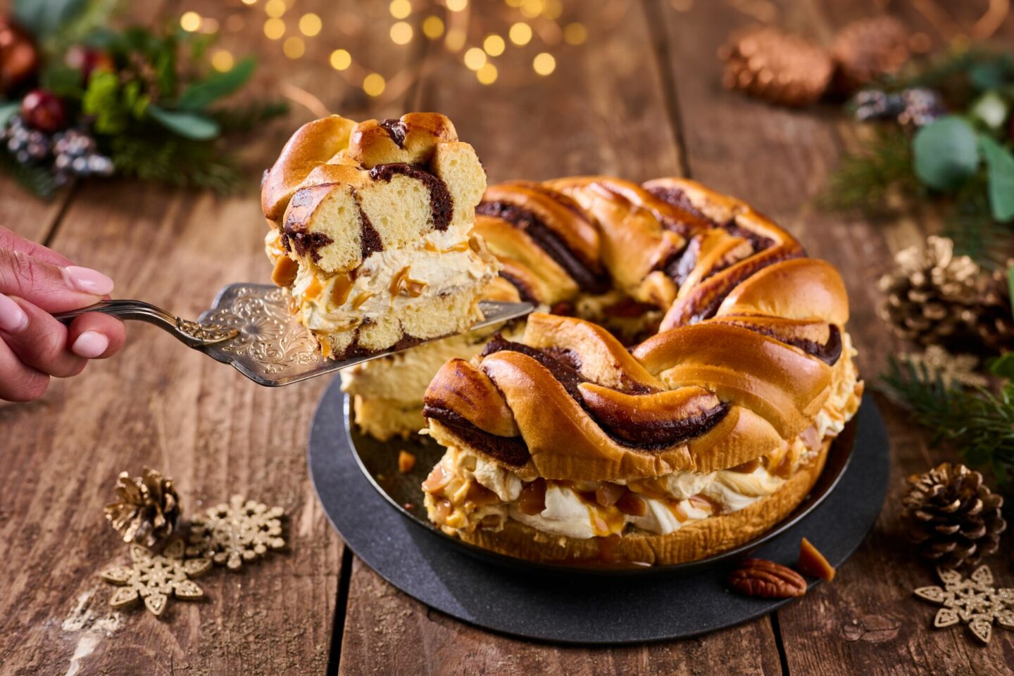 Sticky Toffee Chocolate Brioche Wreath Slice With hand